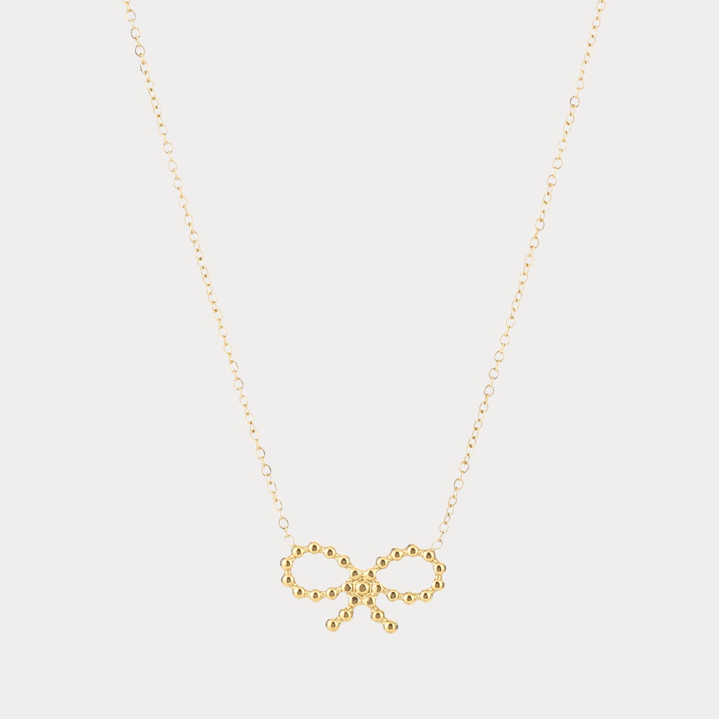 Small Bow Charm Necklace - gold
