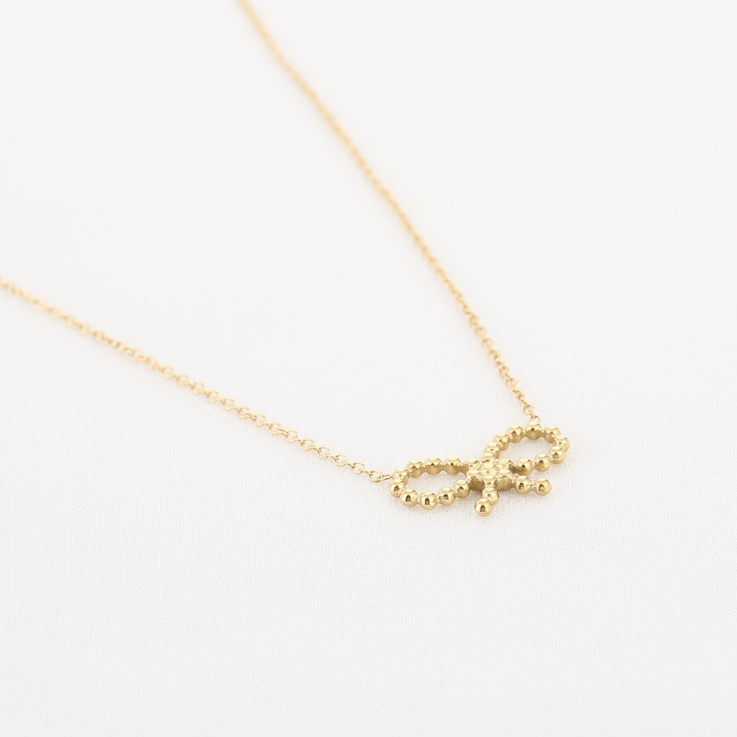 Small Bow Charm Necklace - gold