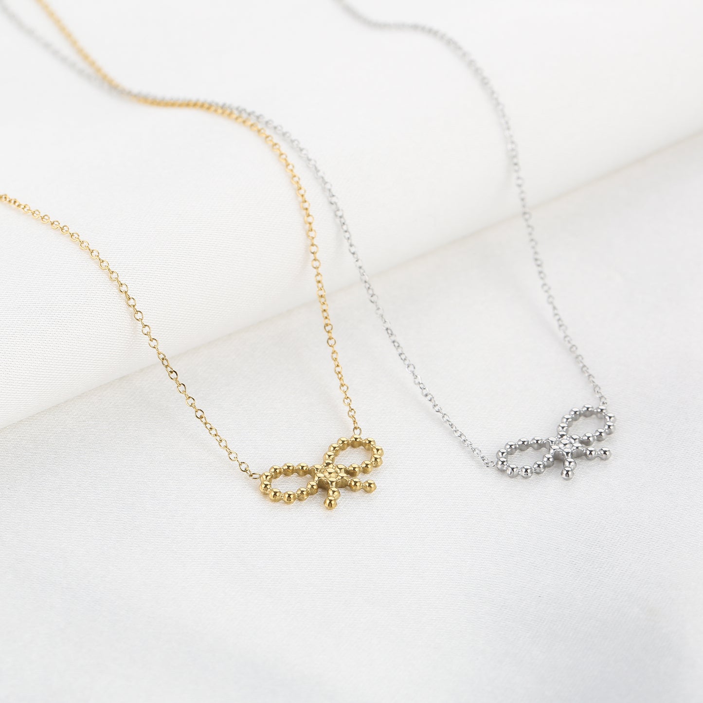 Small Bow Charm Necklace - gold